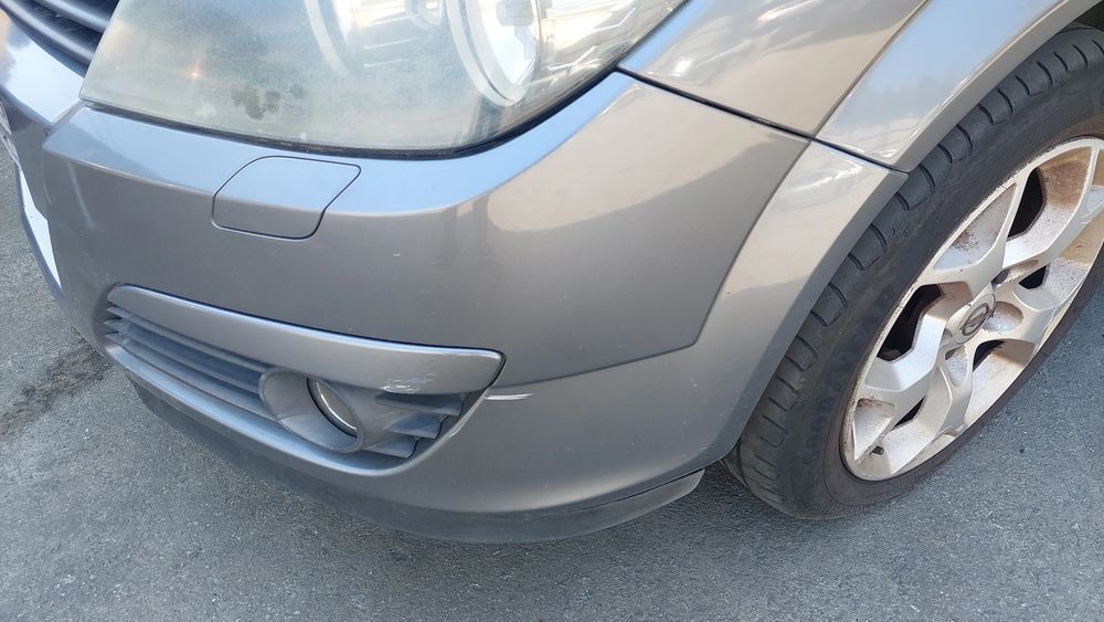 Pára-choques frente OPEL Astra H Caravan (L35)