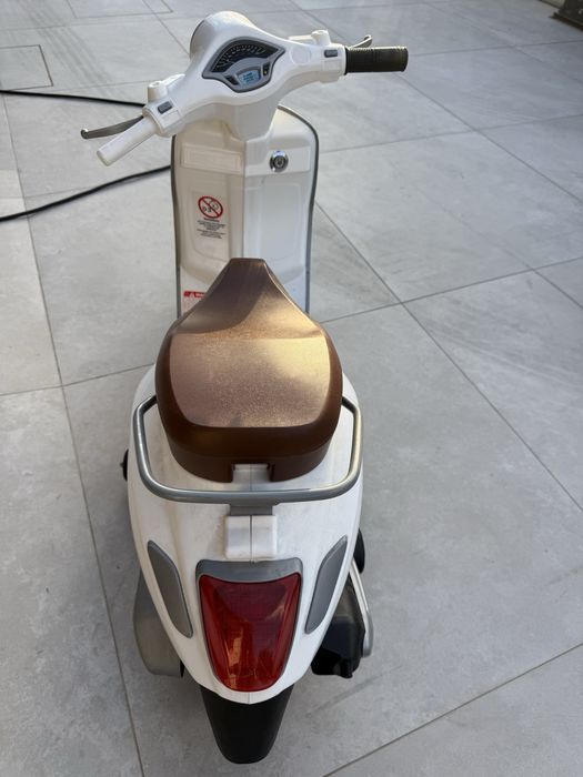 Vespa carregavel