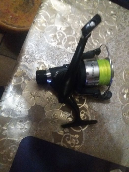 Kołowrotek Strike i wędkę Robinson