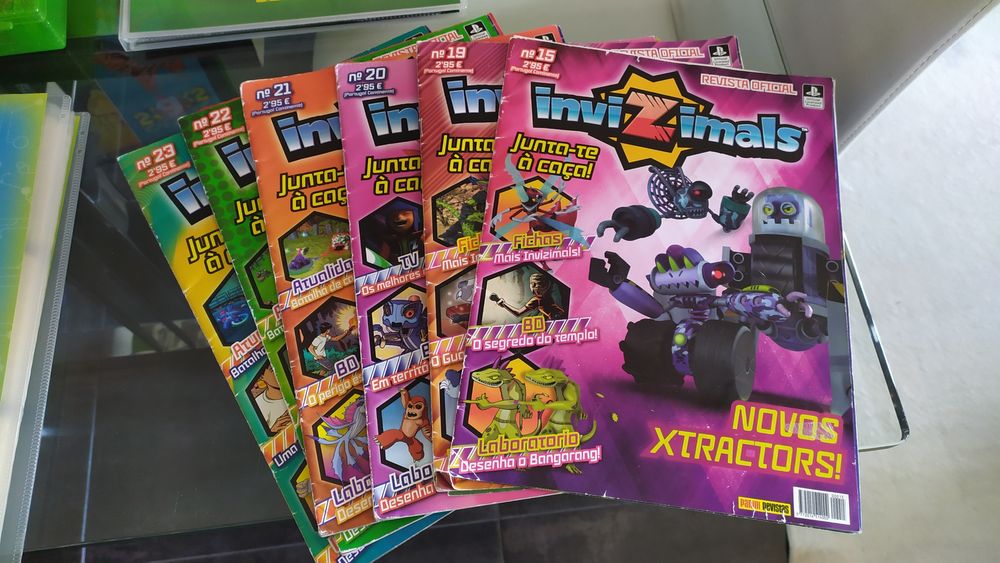 Lote INVIZIMALS 4 cadernetas +caixa arqui. + 2 tabuleiros+ 6 revistas