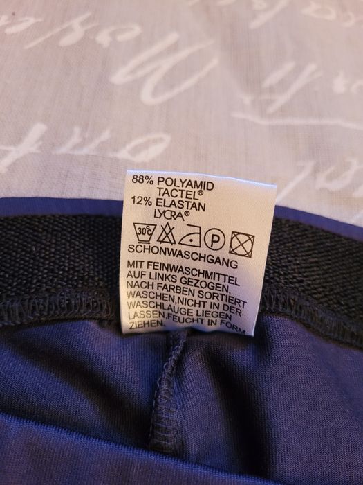 Granatowe obcisle dzianinowe rozszerzane sportowe spodnie wysoki stan