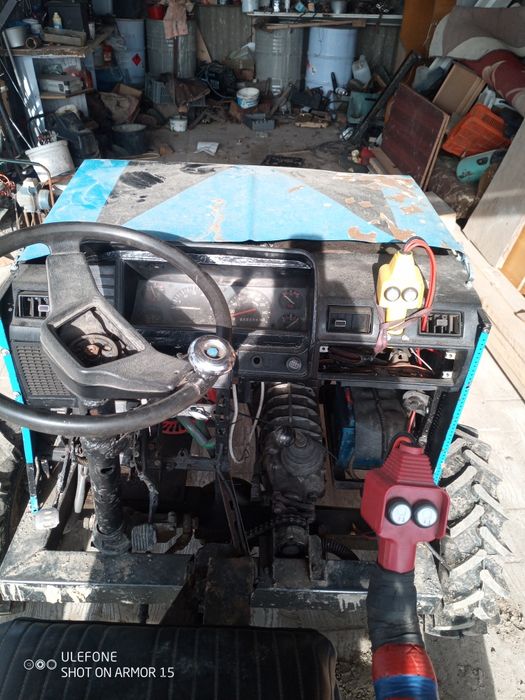 Продам Трактор 4х4 ,гідравліка електрична підйом 180кг двигун 24 кс