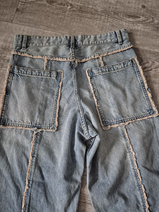 Luźne spodnie jeansy baggy Bershka M