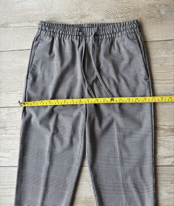 Męskie spodnie H&M w kratę rozm. XS