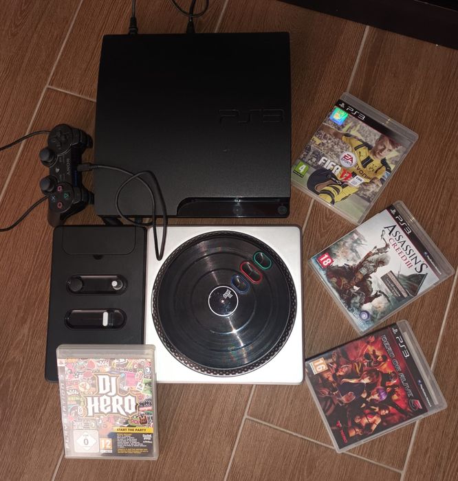 PS3 com comando + DJ HERO com 4 jogos