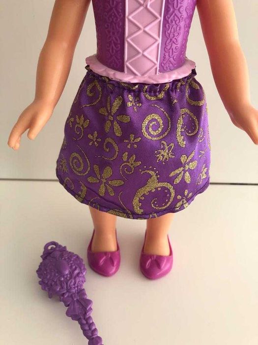 Boneca Rapunzel como nova
