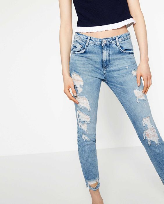 Nowe jeansy Zara z dziurami