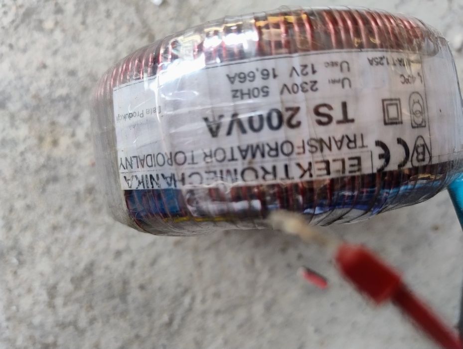 transformator toroidalny firmy ELEKTROMECHANIKA o oznaczeniu TS 200VA.