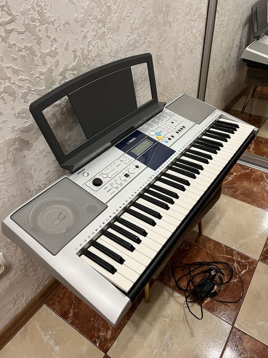 Yamaha E 323 Офіціал.