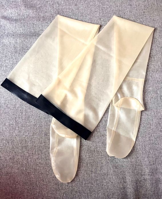 772/ Nowe pończochy lateks transparentne XL czarny pasek manszeta