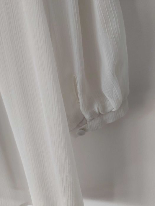 Elegancka bluzka w stylu vintage z rękawem 3/4 Guziki, dekolt V, Atmo