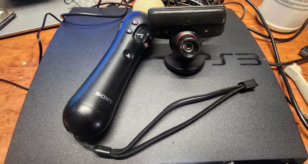 4Sony PlayStation 3 Slim 250GB | FABRYCZNE PLOMBY | PS Move Starter Pack | 2 Pady | Gry | GTA V