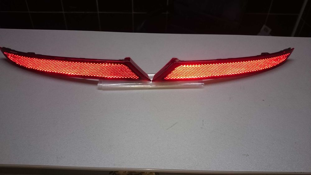 Volkswagen Passat b8 катафоты, отражатели бампера 561945105, 561945106