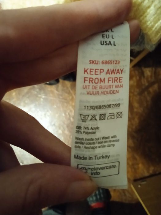 Акриловий пастельний светр на гудзиках