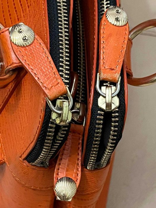 не велика помаранчева шкіряна сумка Modalu