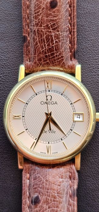 Omega em DE Ville Ouro