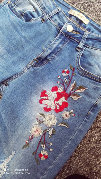 Spodnie Jeansy wyszywane przetarcia rozmiar 36 S