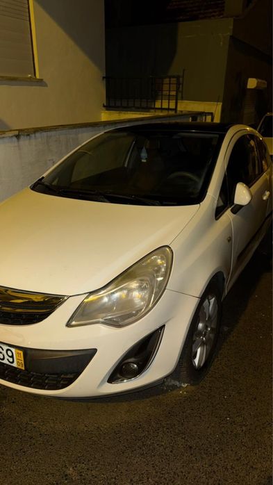 Opel corsa 2011 teto solar