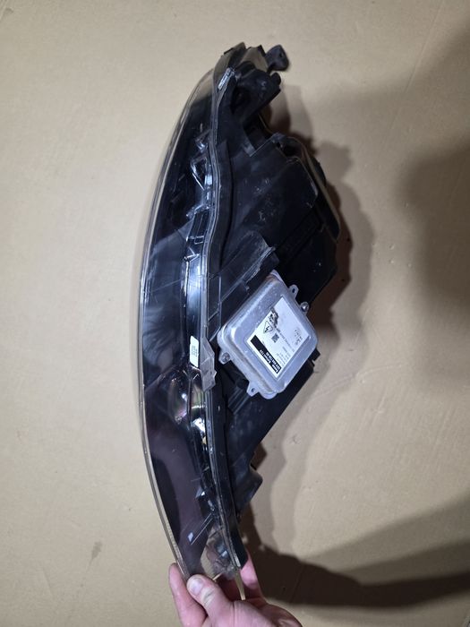 Opel Astra J Lampa przednia 1ZT010012