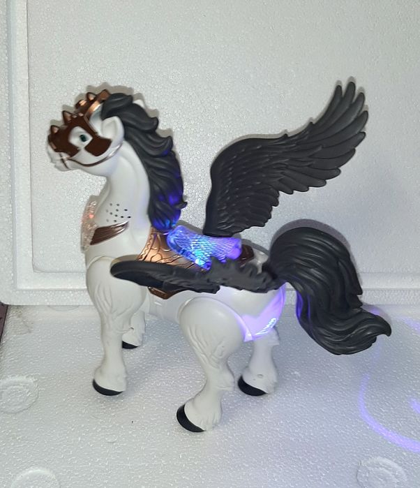 Игрушка  музыкальная  - лошадка  Пегас