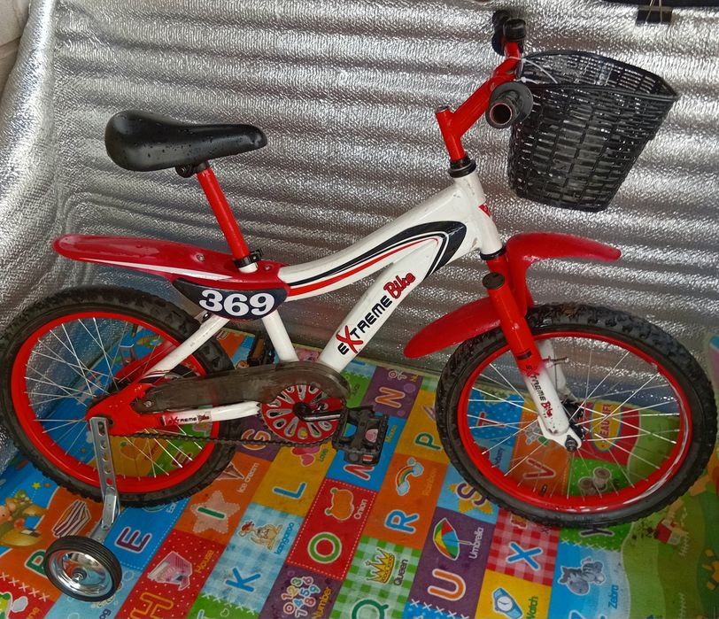 Продам детский велосипед Extreme Bike на 18 дюймов+колесики.