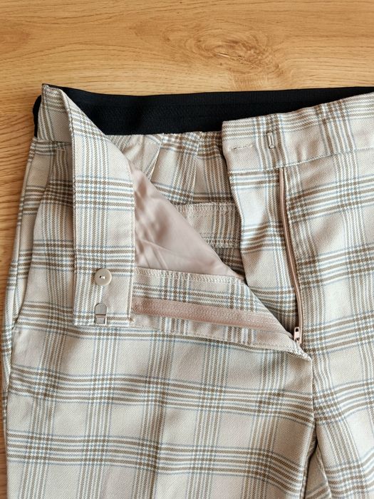 Spodnie w kratkę Zara