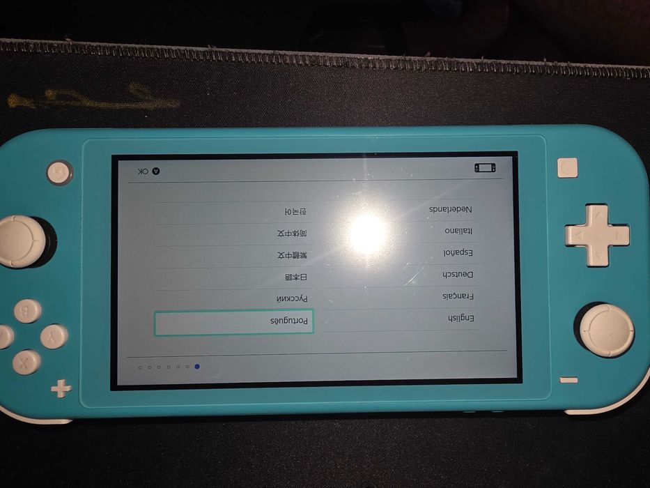Nintendo Switch Lite (com capa e bolsa)