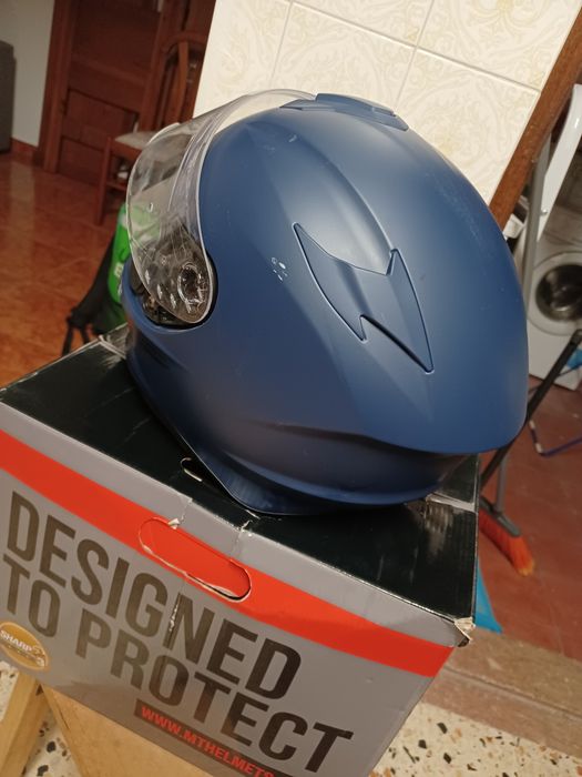 Capacete semi novo