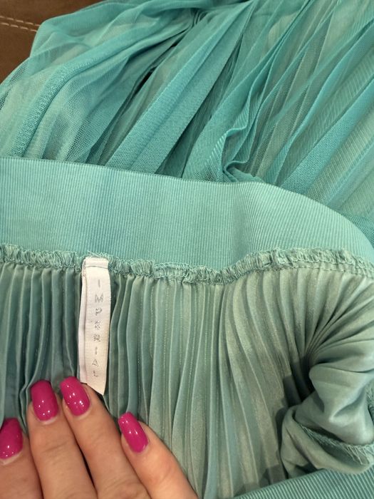 Saia plissada Imperial