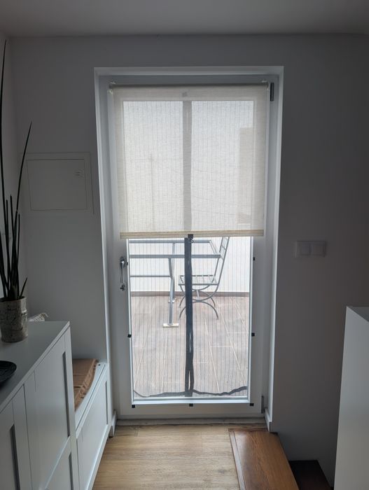 Estore de correr em rolo bege