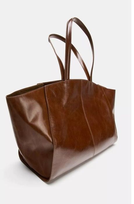 Жіноче та чоловіче взуття  ZARA