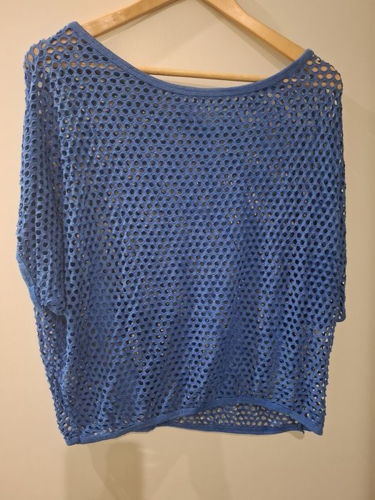 T-shirt Azul
Tamanho Unico
95% viscose