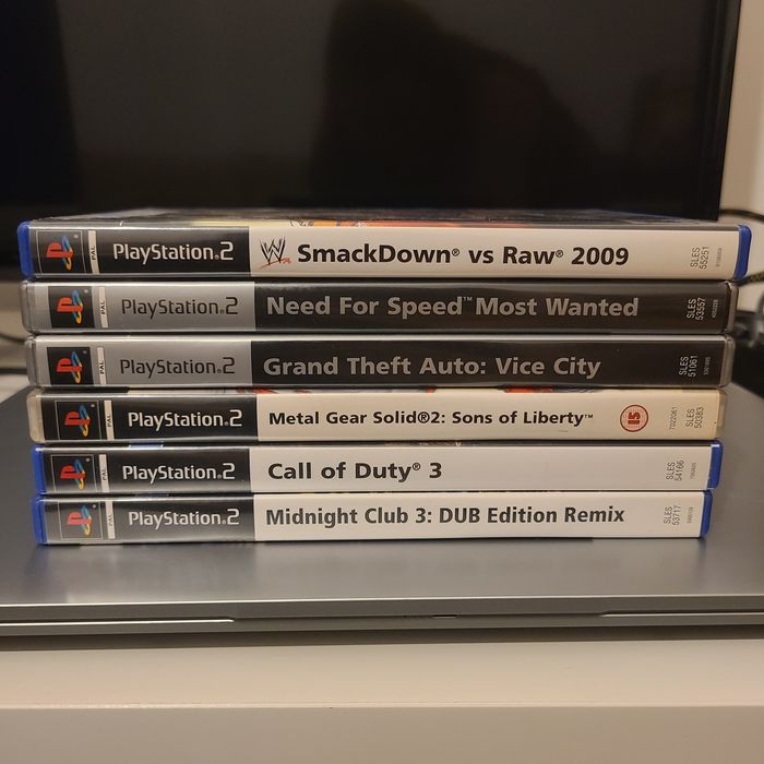 Playstation 2 slim + cartão de memória 32 mb + 6 jogos