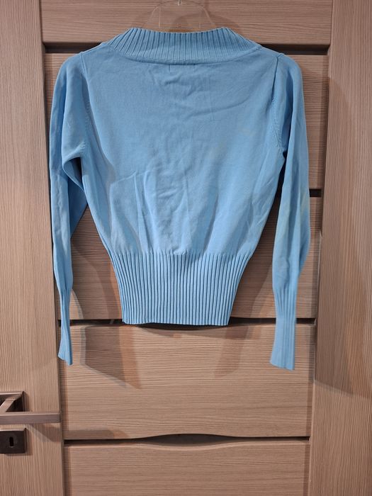 Sweterek niebieski z DIMA.