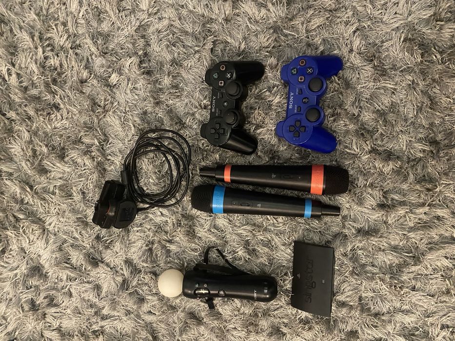 Playstation 3 + 17 gier + pady + alcesoria (Move/Skylanders/Singstar)
