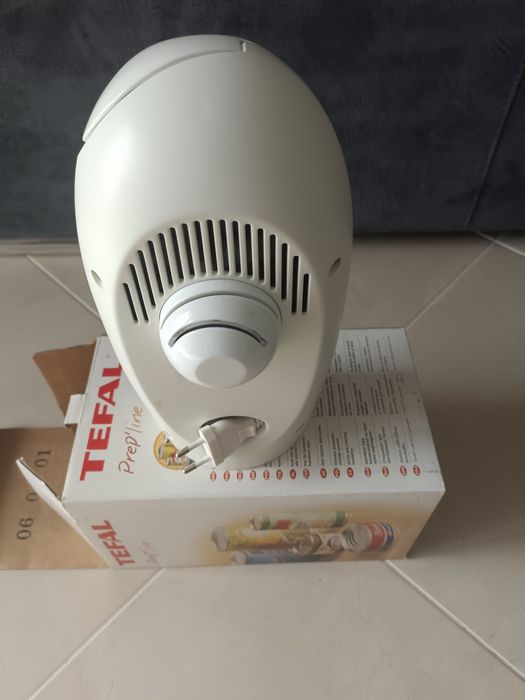 Abre latas com afia faca tefal