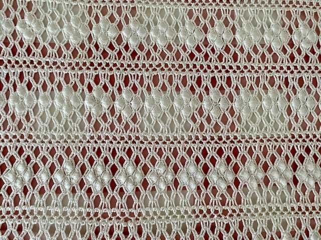 Colcha de renda feita à mão