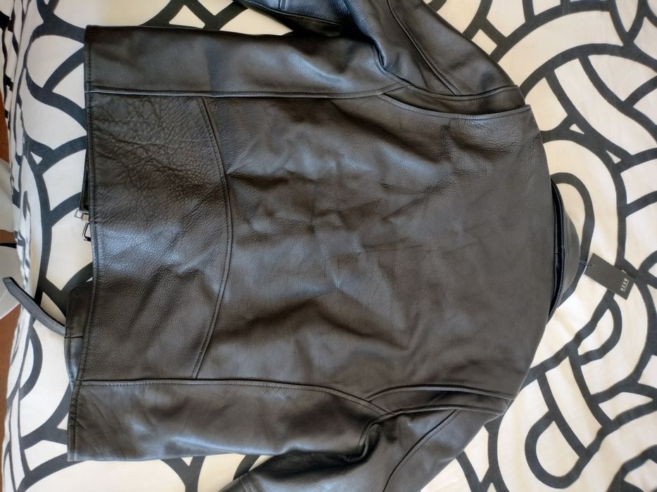 Casaco em pele genuína