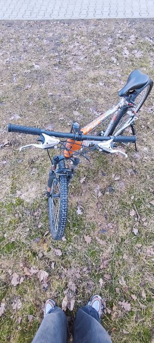 Rower srebrno-pomarańczowy  KTM