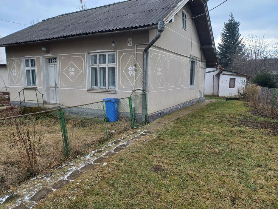 Будинок і земелна ділянка