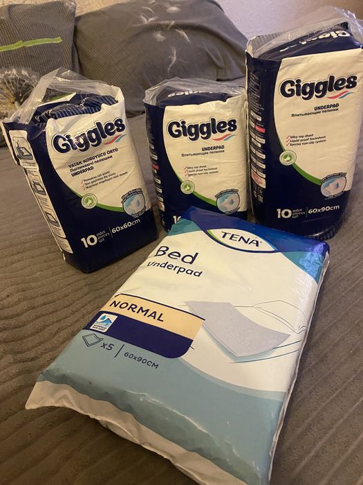 Пелюшки одноразові giggls та Tena