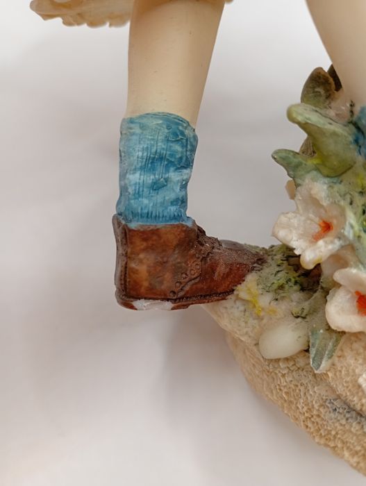 Figurka dziewczynka z taczką