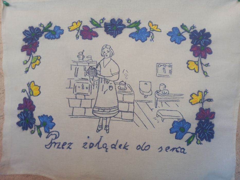 Makatka ścienna ręcznie haftowana nowa.Przez żołądek do serca.