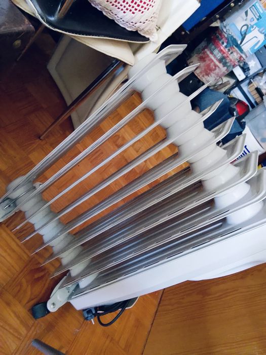 Aquecedor a óleo 2000W com termostato – ótimo estado