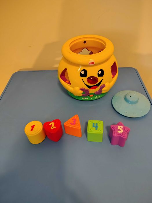 Garnuszek Fisher Price