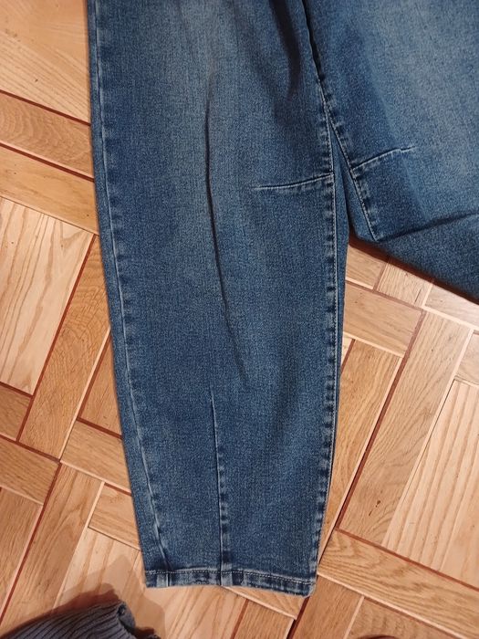 Джинси труби синього кольору