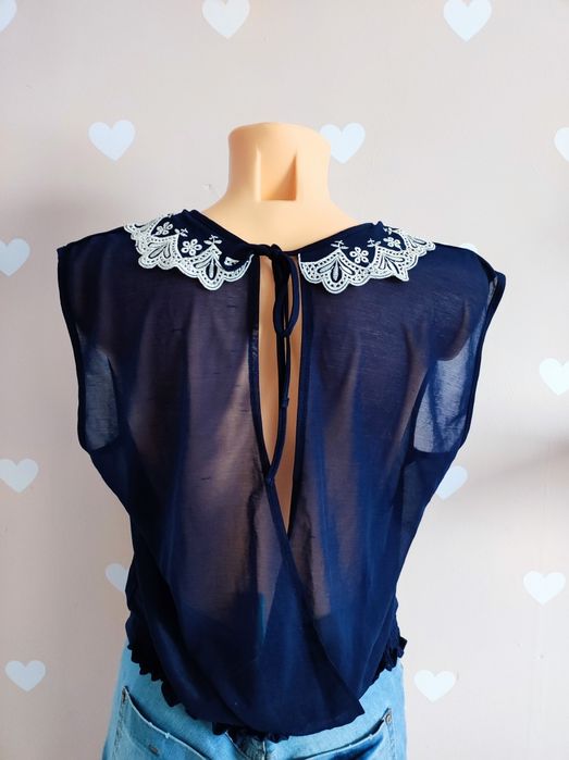 Granatowy prześwitujący top ozdobny kołnierzyk 38 M