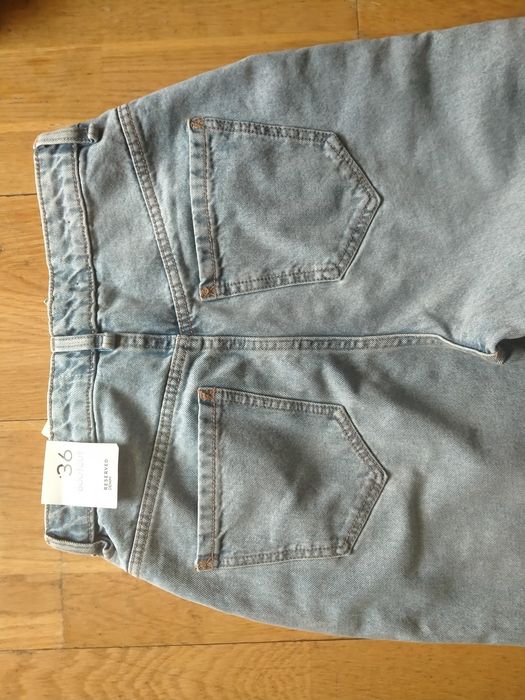 Jeansy boot cut rozszerzane  Reserved 36