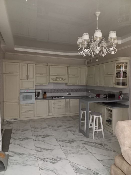 Дом с хорошей планировкой и садом ,В лесках