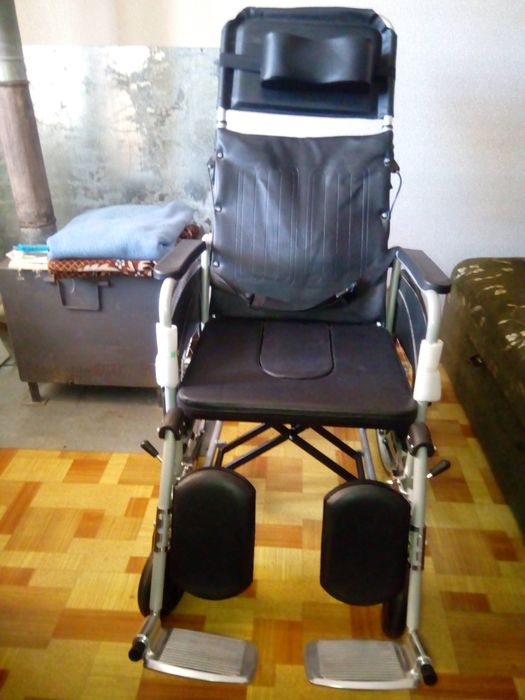 Инвалидная коляска .